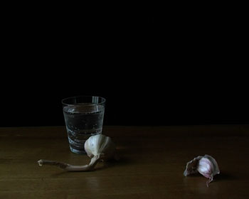 still life with glass & garlic by Joanna Hill